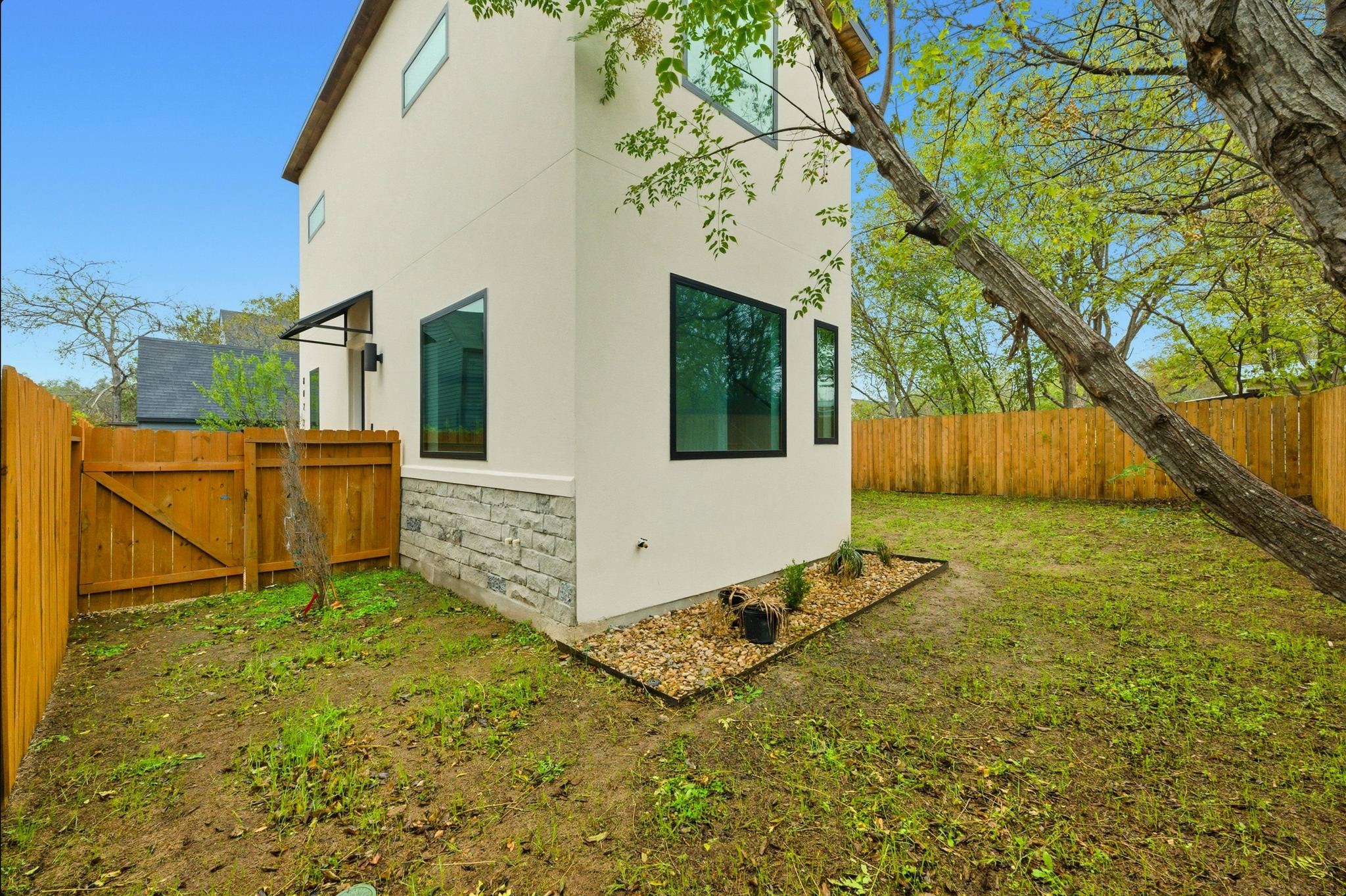 802 Philco Drive, Unit 2 Austin, TX 78745 - Photo 25 of 29 a view of a backyard