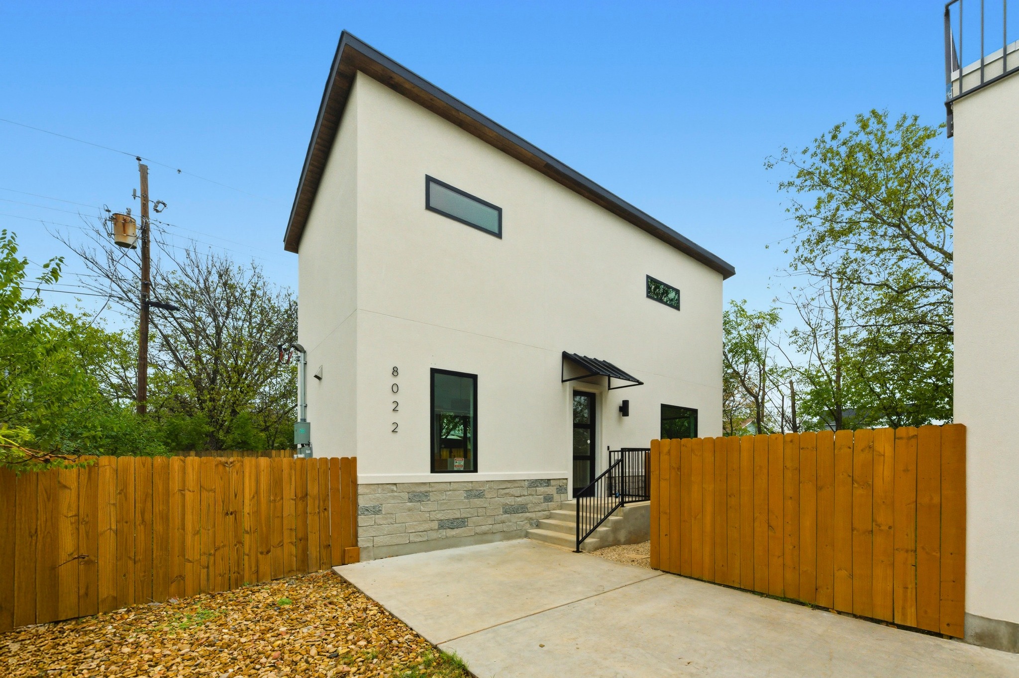 802 Philco Drive, Unit 2 Austin, TX 78745 - Photo 26 of 29 a view of a house with a backyard