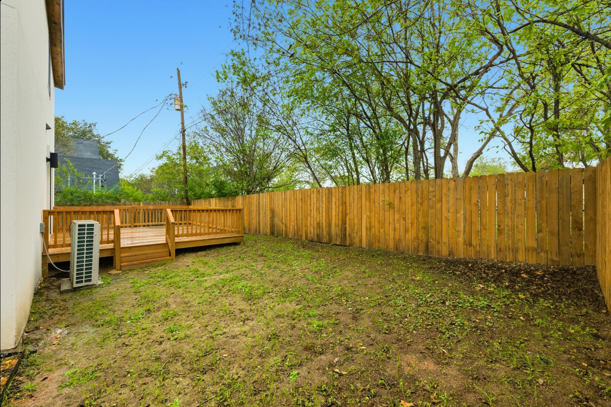 802 Philco Drive, Unit 2 Austin, TX 78745 - Photo 28 of 29 a backyard of a house with lots of green space