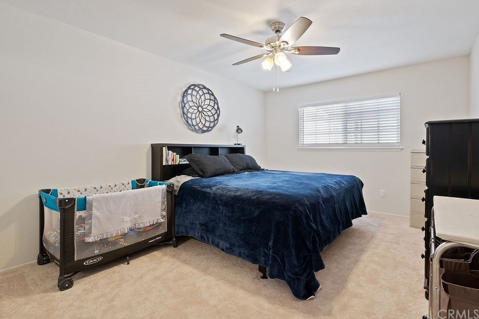 1085 Driftwood Circle Placentia, CA 92870 - Photo 9 of 18 a bedroom with a bed and a table in it