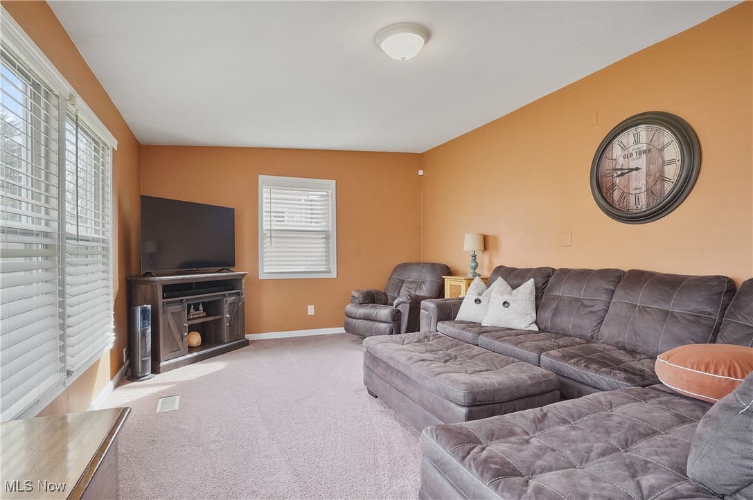 1533 Old Forge Road Kent, OH 44240 - Photo 15 of 33 Carpeted living area featuring baseboards