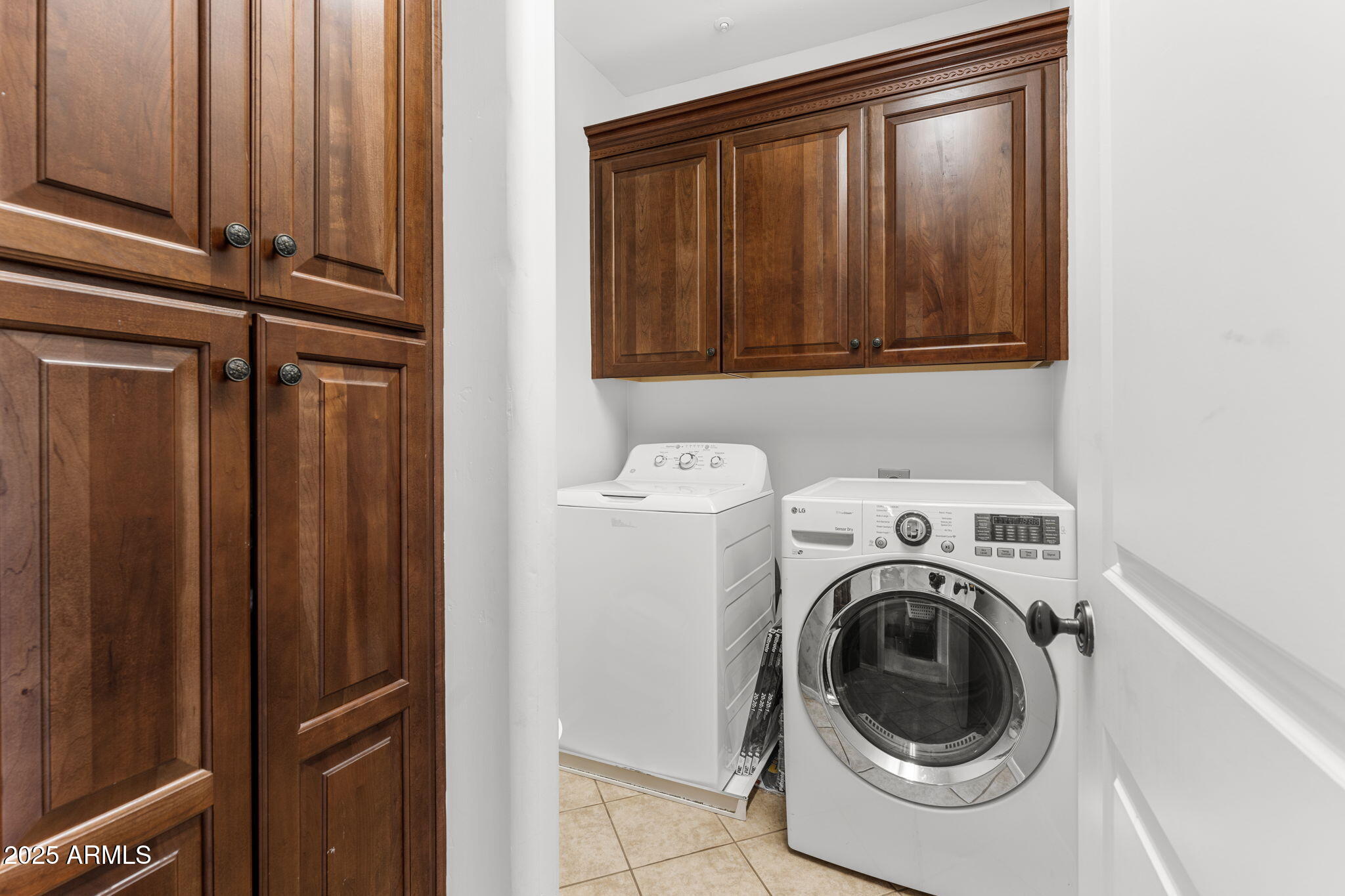 9285 East Canyon View Scottsdale, AZ 85255 - Photo 29 of 39 Inside Laundry near bedrooms