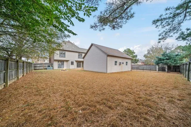 a house view with a outdoor space