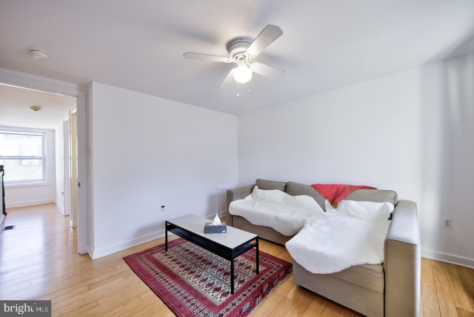 1325 Webster Street Philadelphia, PA 19147 - Photo 18 of 20 a living room with furniture and a wooden floor