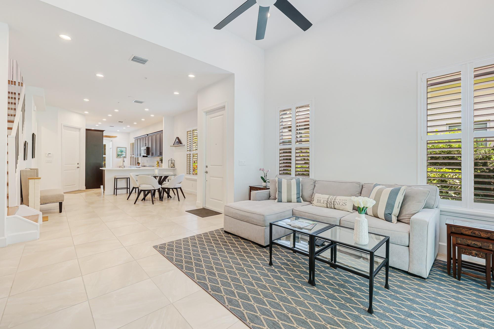 22954 Clear Echo Drive, Unit 31 Boca Raton, FL 33433 - Photo 13 of 38 a living room with furniture and a large window