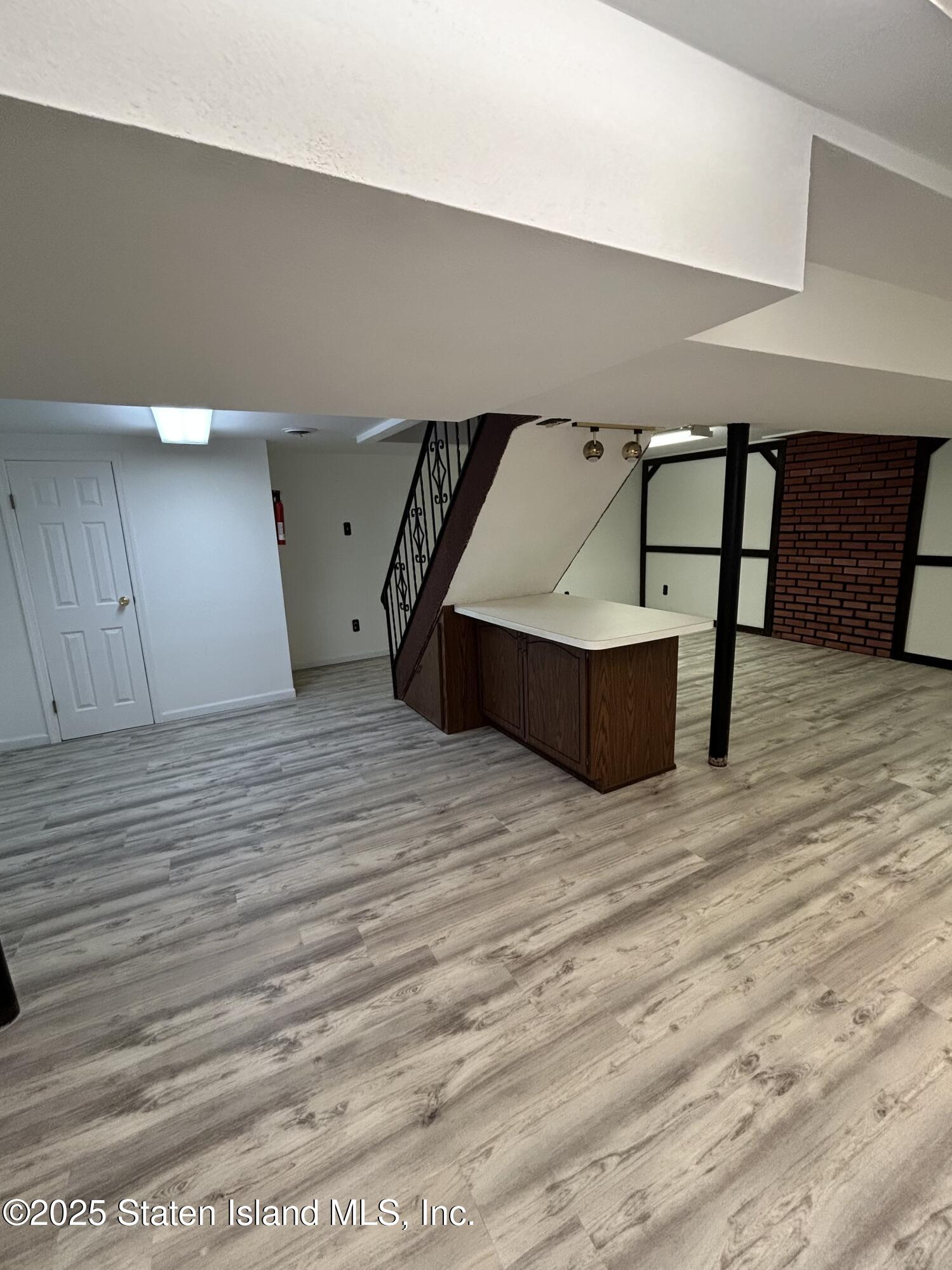 173 Rome Avenue Staten Island, NY 10304 - Photo 21 of 27 a bedroom with a bed and window