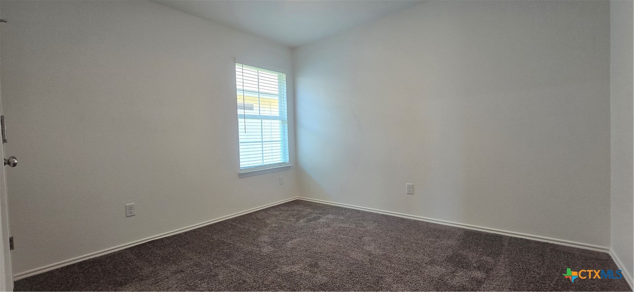 334 Monty Road Copperas Cove, TX 76522 - Photo 11 of 17 an empty room with windows