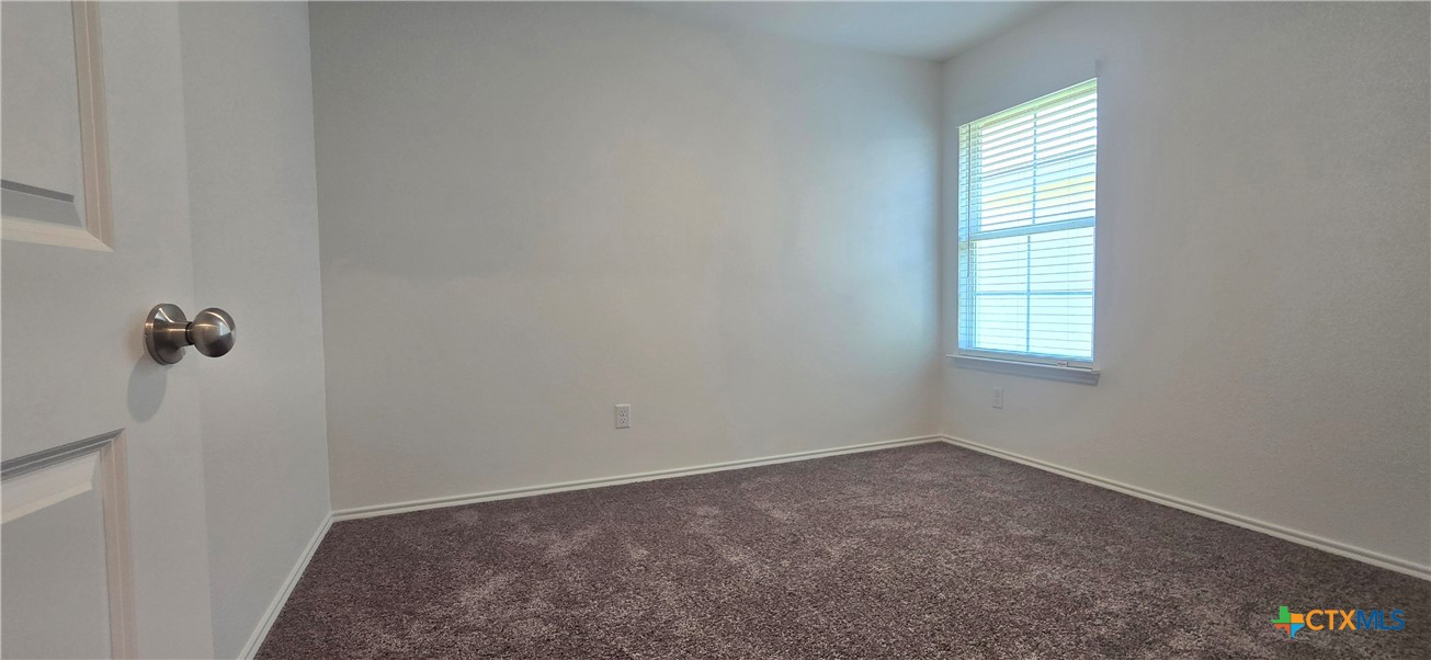 334 Monty Road Copperas Cove, TX 76522 - Photo 13 of 17 an empty room with windows