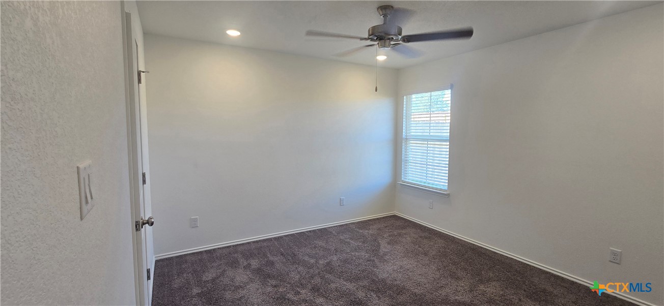 334 Monty Road Copperas Cove, TX 76522 - Photo 17 of 17 an empty room with windows and fan