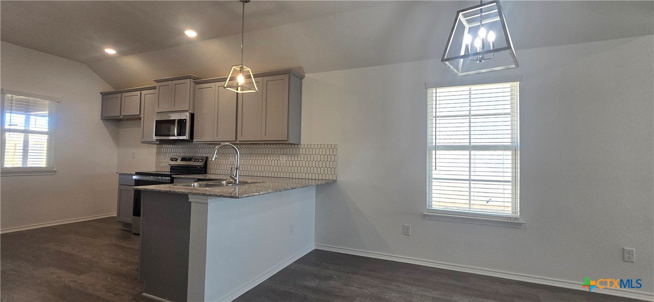 334 Monty Road Copperas Cove, TX 76522 - Photo 4 of 17 a kitchen with a sink window and appliances