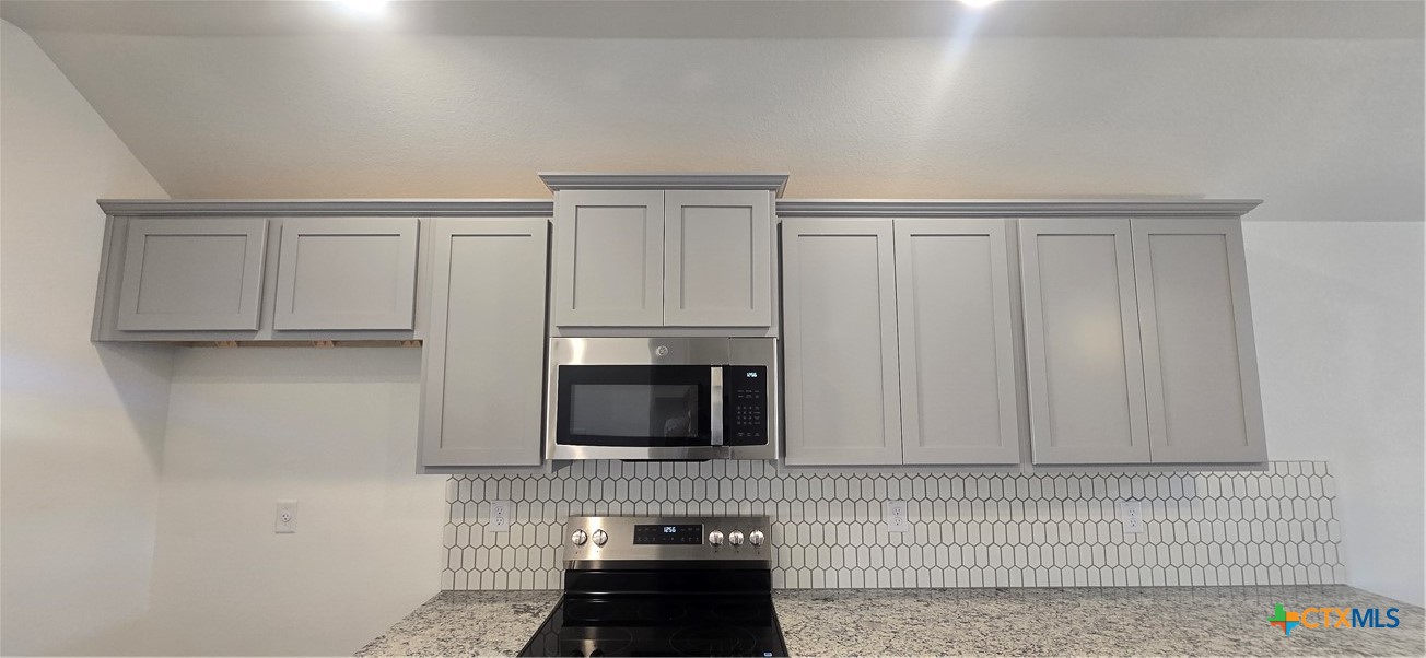 334 Monty Road Copperas Cove, TX 76522 - Photo 6 of 17 a bathroom with a sink and a mirror