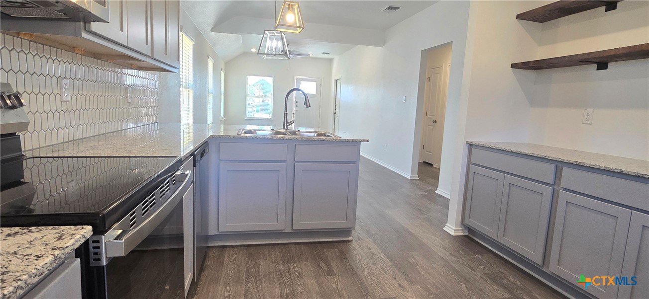 334 Monty Road Copperas Cove, TX 76522 - Photo 9 of 17 a bathroom with a sink a vanity and a mirror
