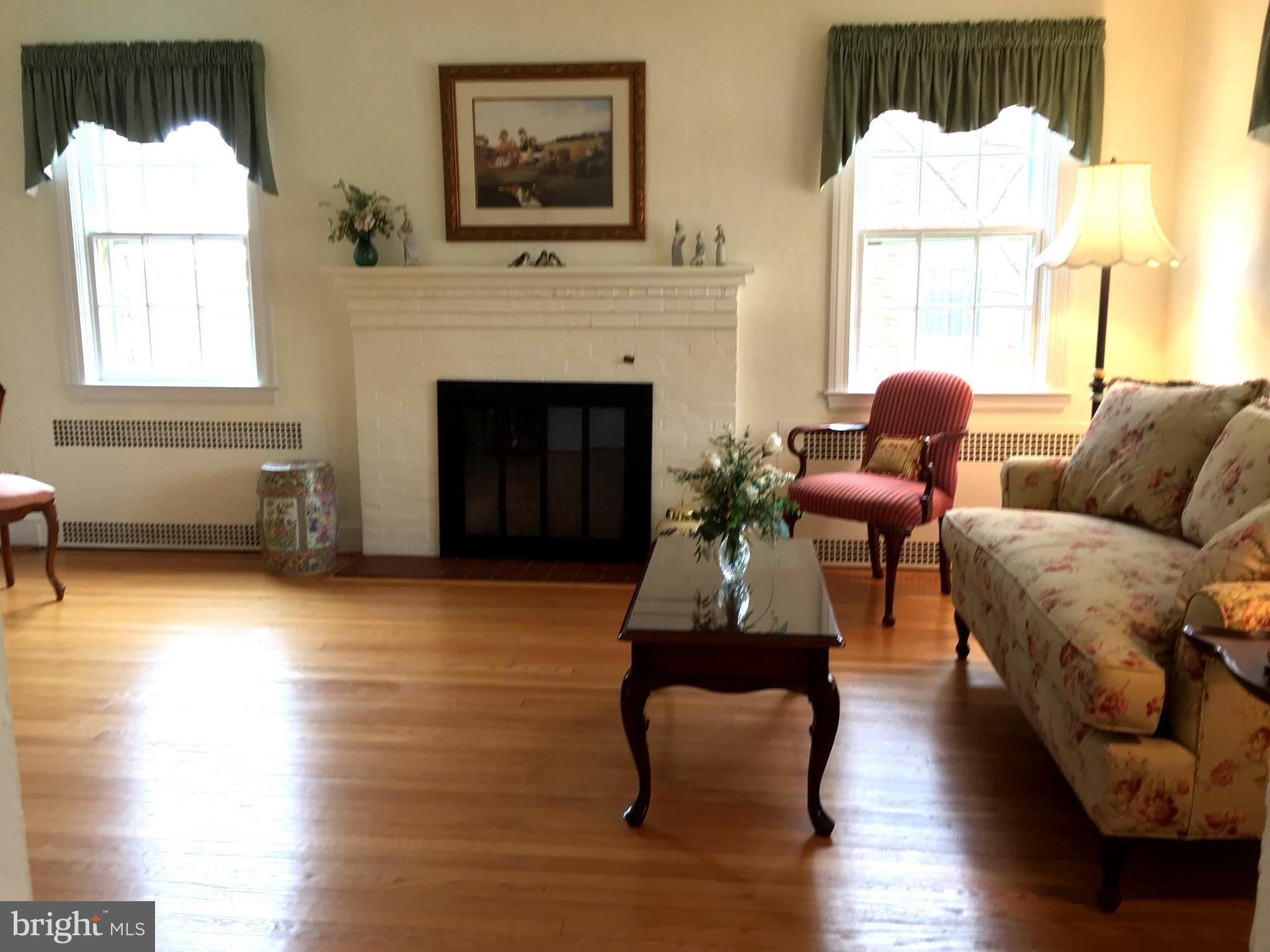 619 Kingston Road Baltimore, MD 21212 - Photo 4 of 30 Fireplace, lots of light, gorgeous hardwoods