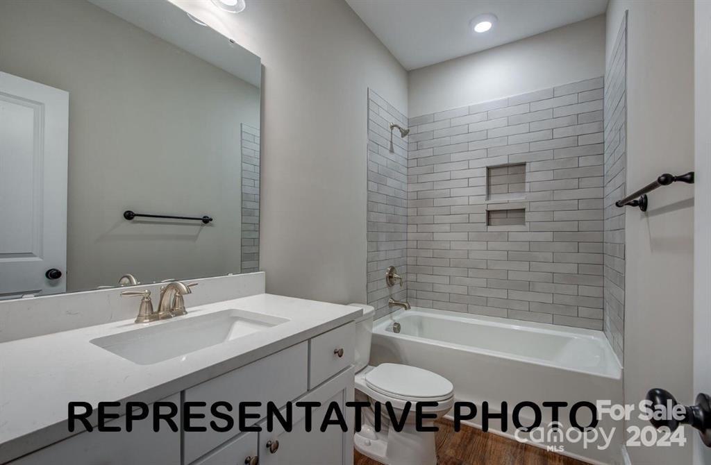 523 Blacksnake Road Stanley, NC 28164 - Photo 3 of 4 a bathroom with a sink and a bathtub
