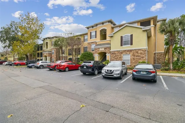 a front view of a house with a lake view