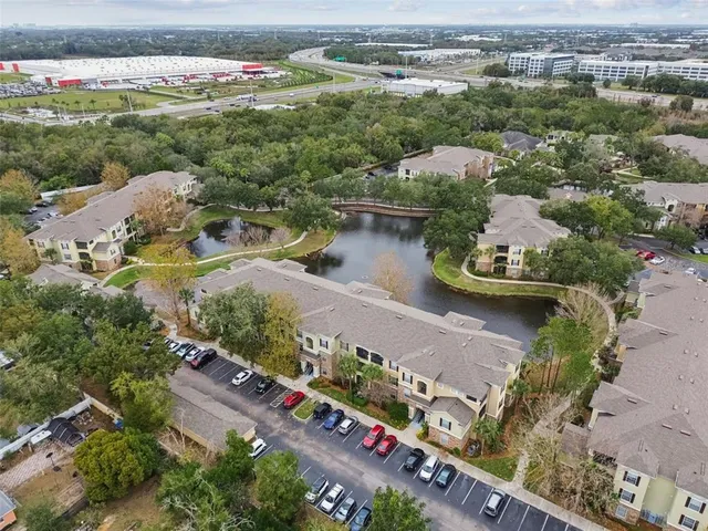 a view of a street with a building in the background