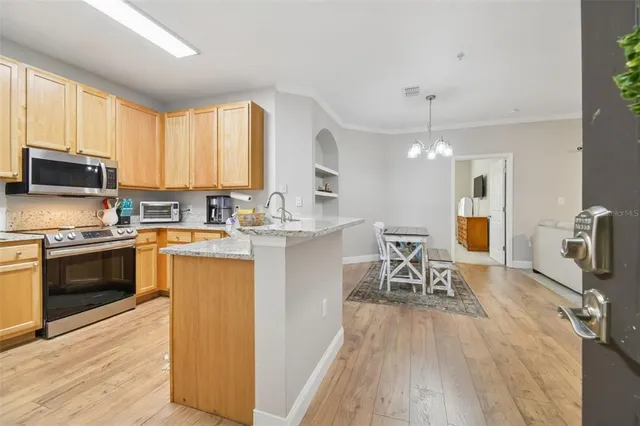 a outdoor living space with furniture and a potted plant