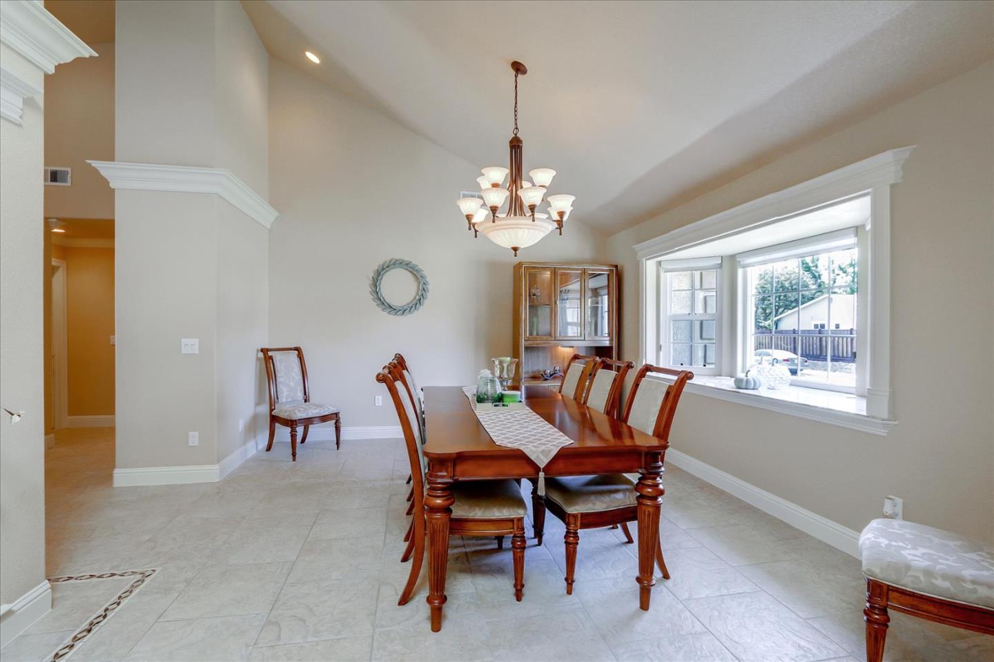 814 Savannah Circle Walnut Creek, CA 94598 - Photo 11 of 41 a dining room with furniture a chandelier and window