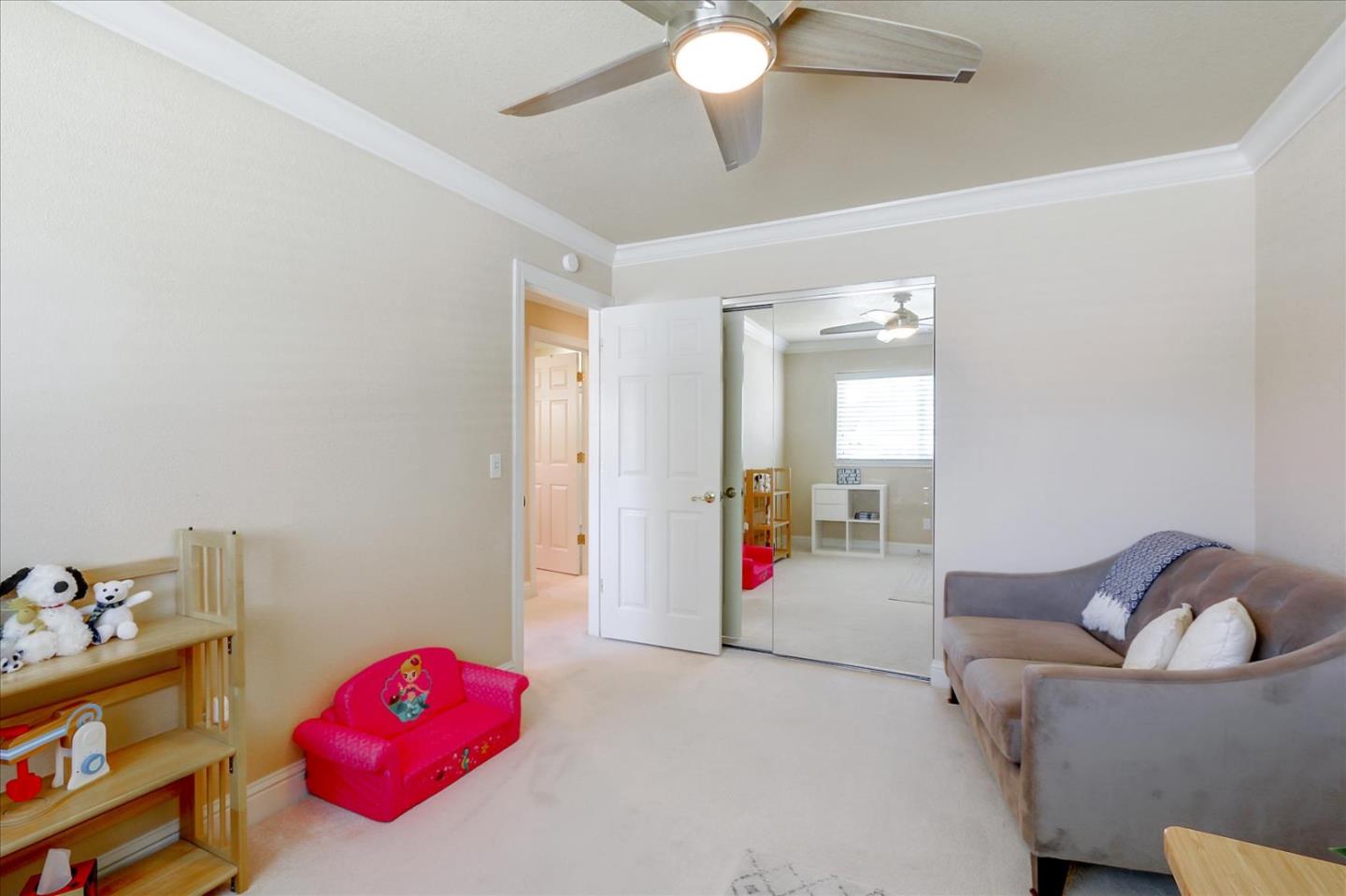 814 Savannah Circle Walnut Creek, CA 94598 - Photo 18 of 41 a living room with furniture and a chandelier