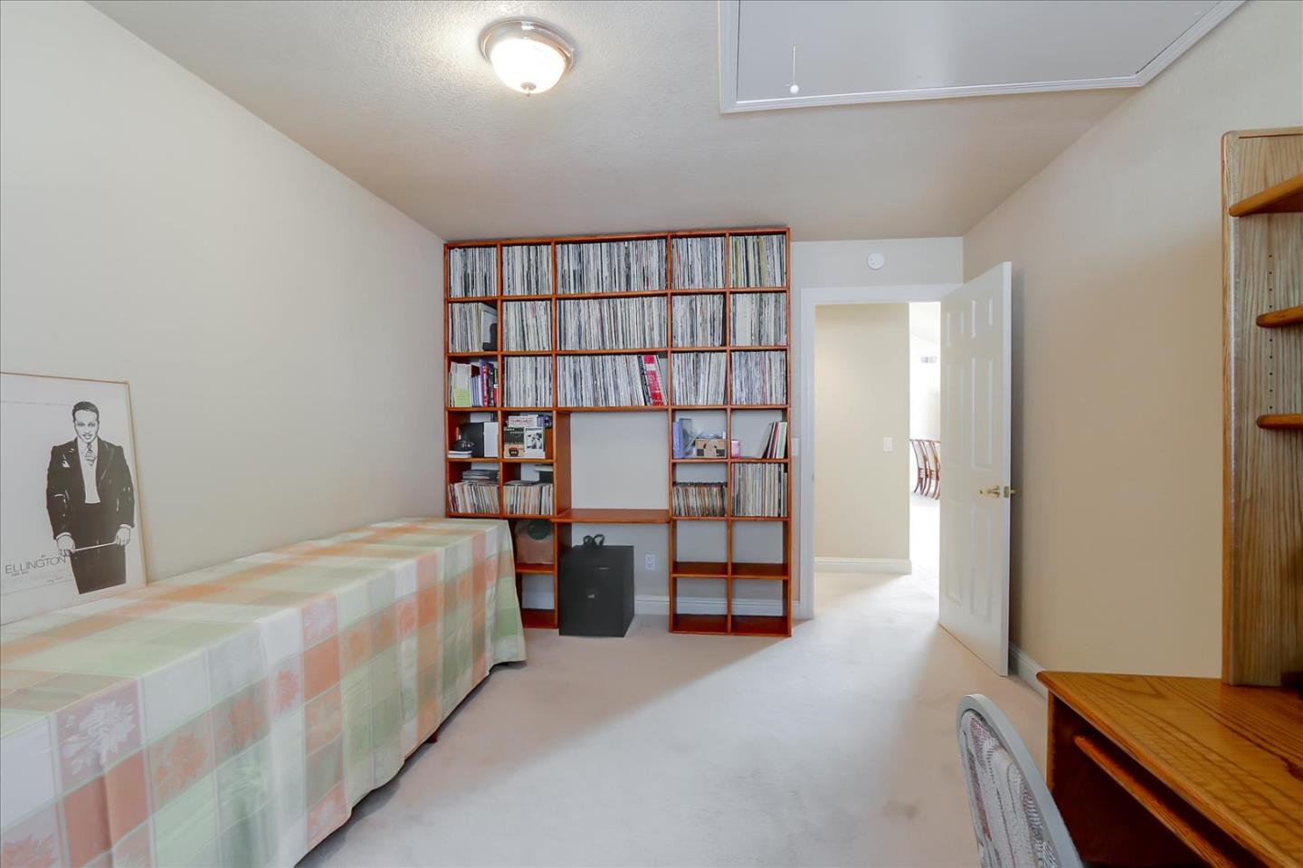 814 Savannah Circle Walnut Creek, CA 94598 - Photo 21 of 41 a bedroom with a bed and a book shelf