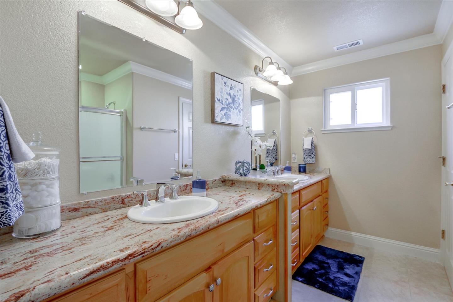 814 Savannah Circle Walnut Creek, CA 94598 - Photo 23 of 41 a bathroom with a sink double vanity and a mirror