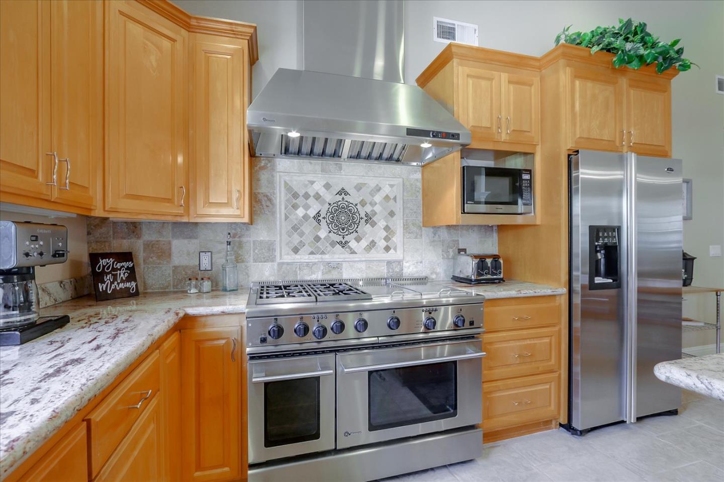 814 Savannah Circle Walnut Creek, CA 94598 - Photo 7 of 41 a kitchen with stainless steel appliances granite countertop a stove a sink and a microwave