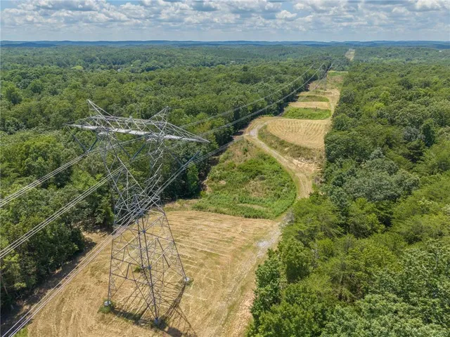 a view of a yard with an outdoor space