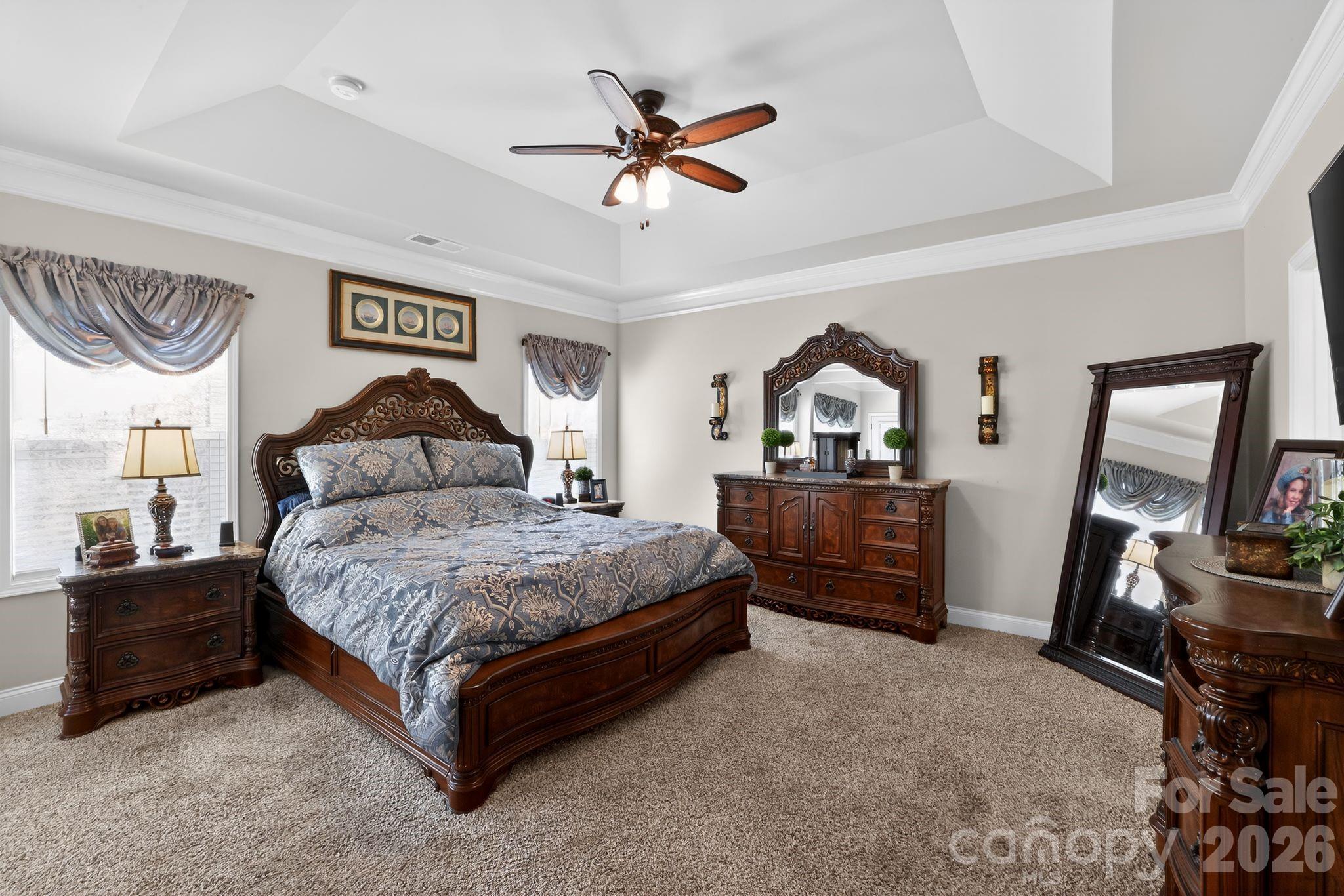 1 Foxmoor Court Simpsonville, SC 29680 - Photo 18 of 36 a bedroom with a bed dresser and a window