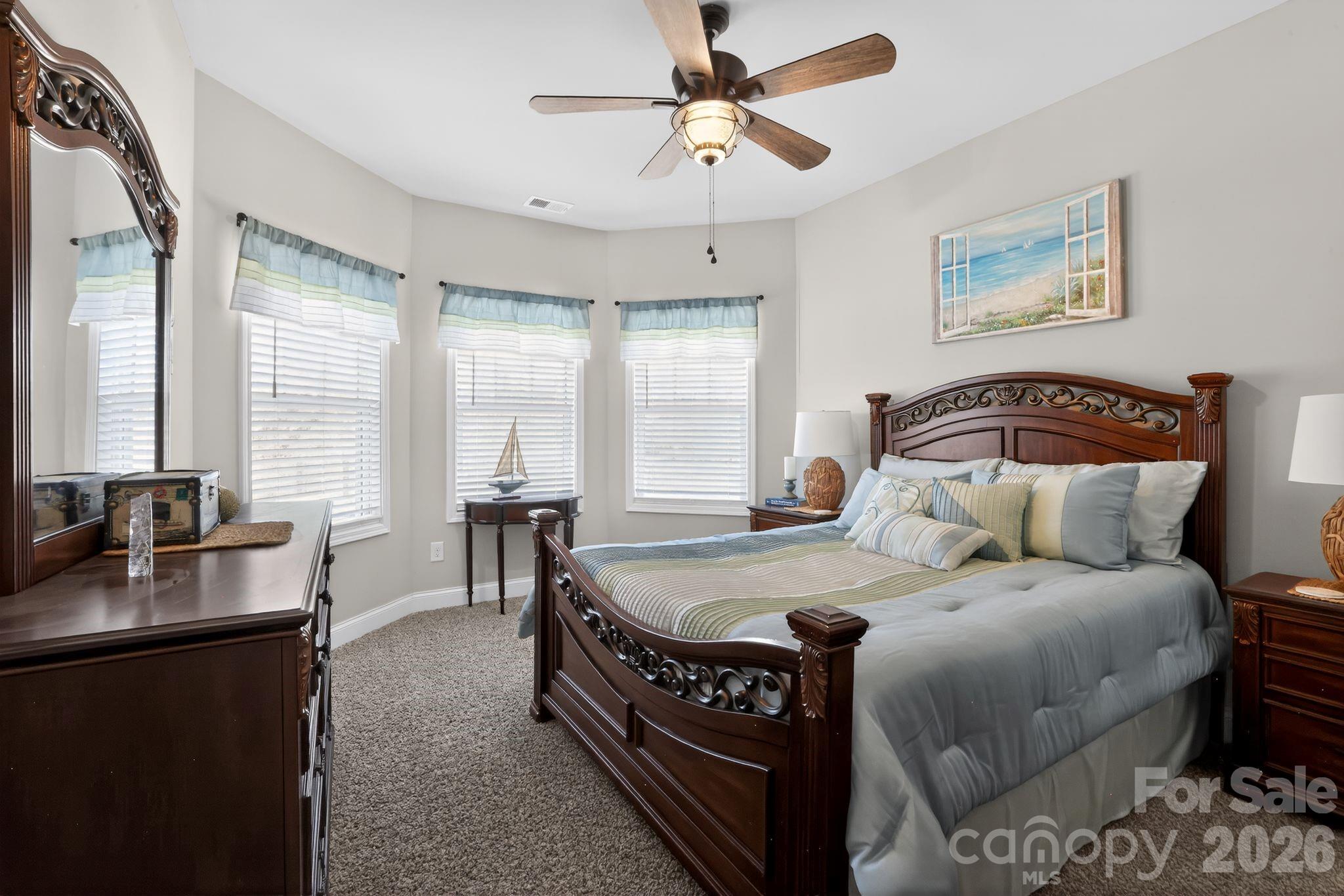 1 Foxmoor Court Simpsonville, SC 29680 - Photo 19 of 36 a bedroom with a bed and a table