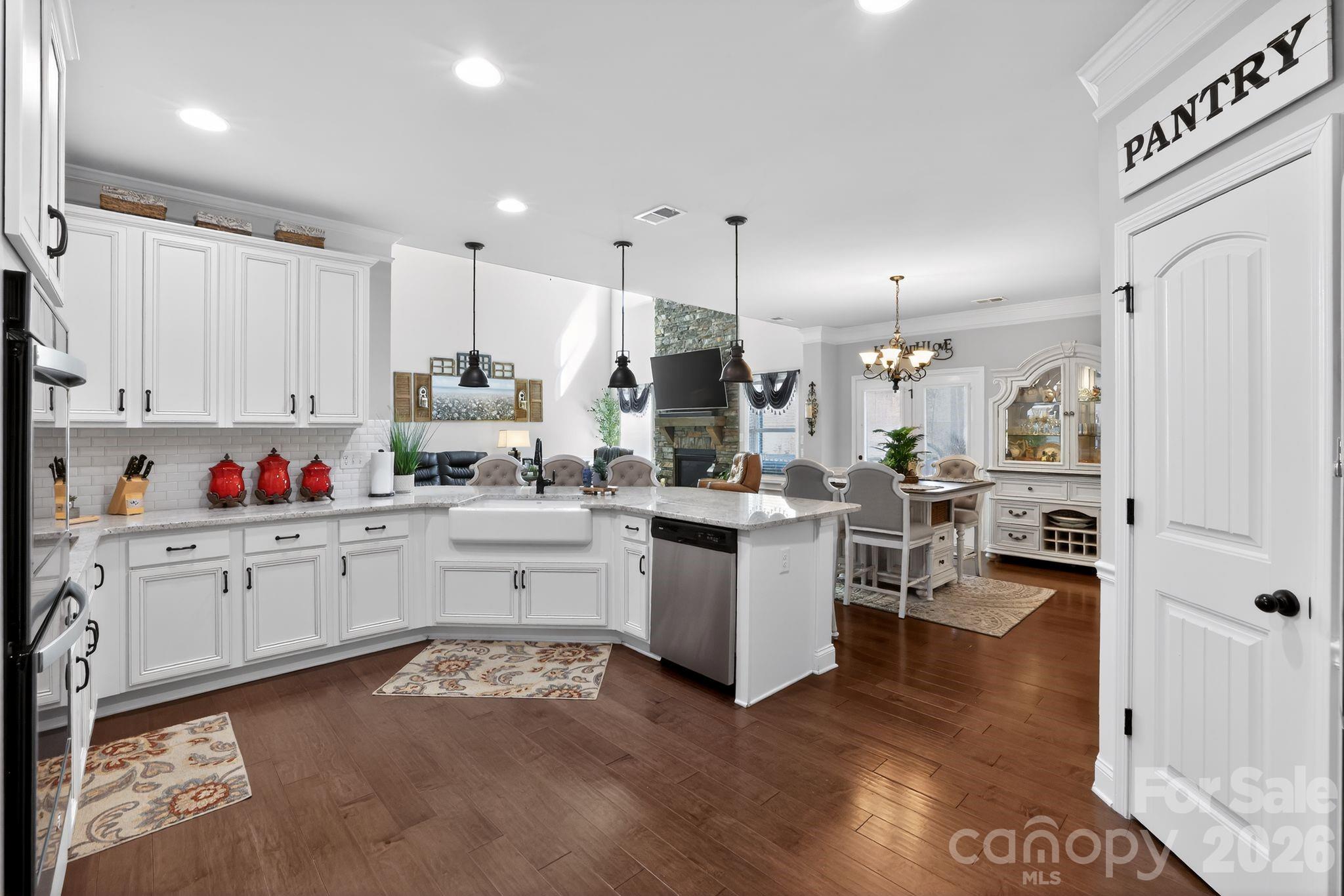 1 Foxmoor Court Simpsonville, SC 29680 - Photo 21 of 36 a kitchen with white cabinets and white appliances