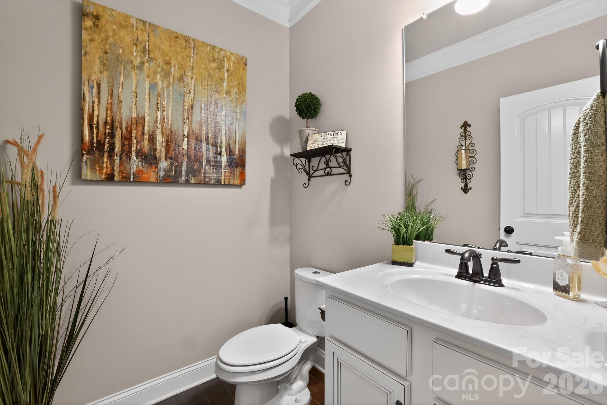 1 Foxmoor Court Simpsonville, SC 29680 - Photo 30 of 36 a bathroom with a granite countertop sink toilet and mirror