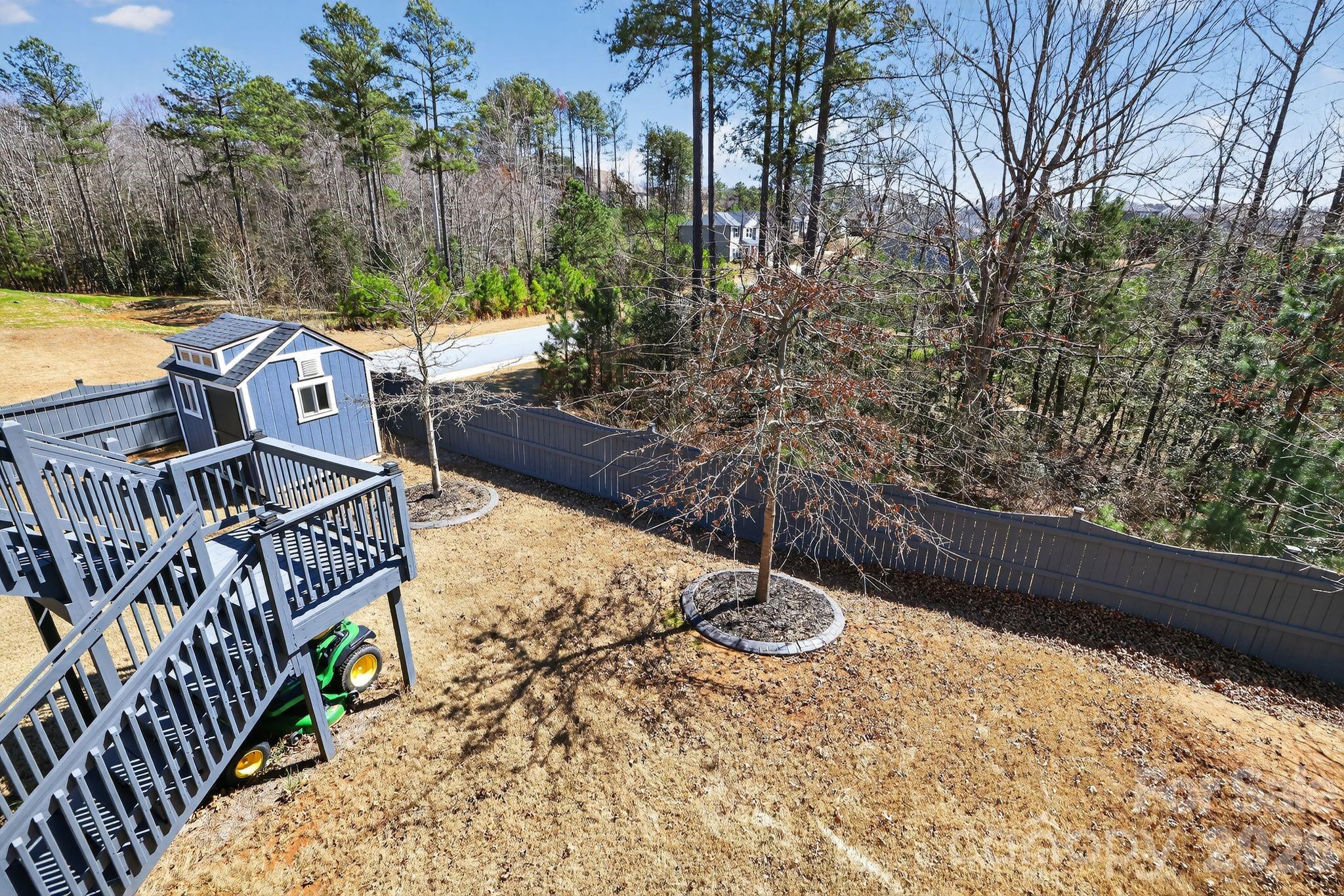 1 Foxmoor Court Simpsonville, SC 29680 - Photo 31 of 36 a view of a chairs with wooden fence