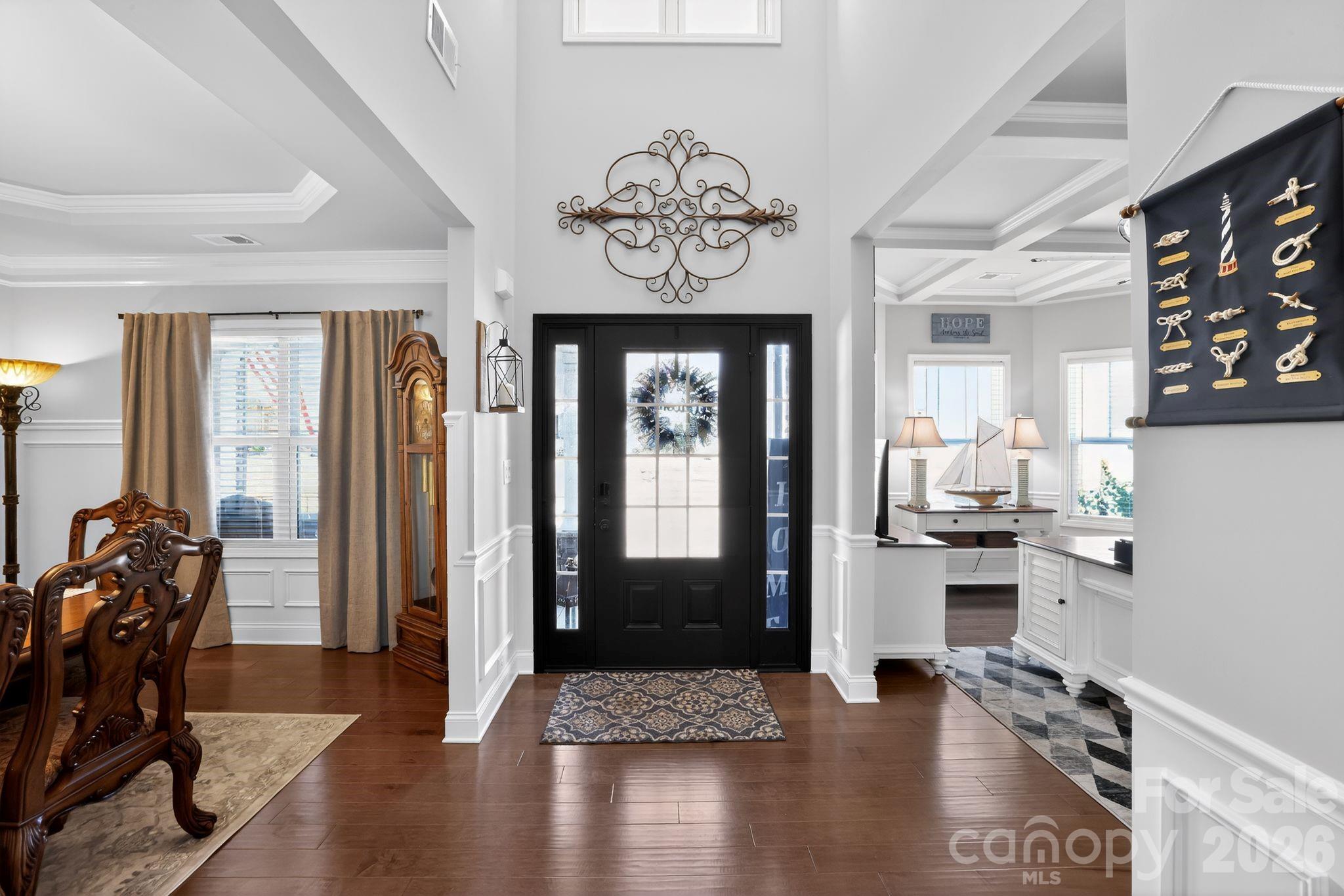 1 Foxmoor Court Simpsonville, SC 29680 - Photo 6 of 36 a view of a hallway with wooden floor and windows