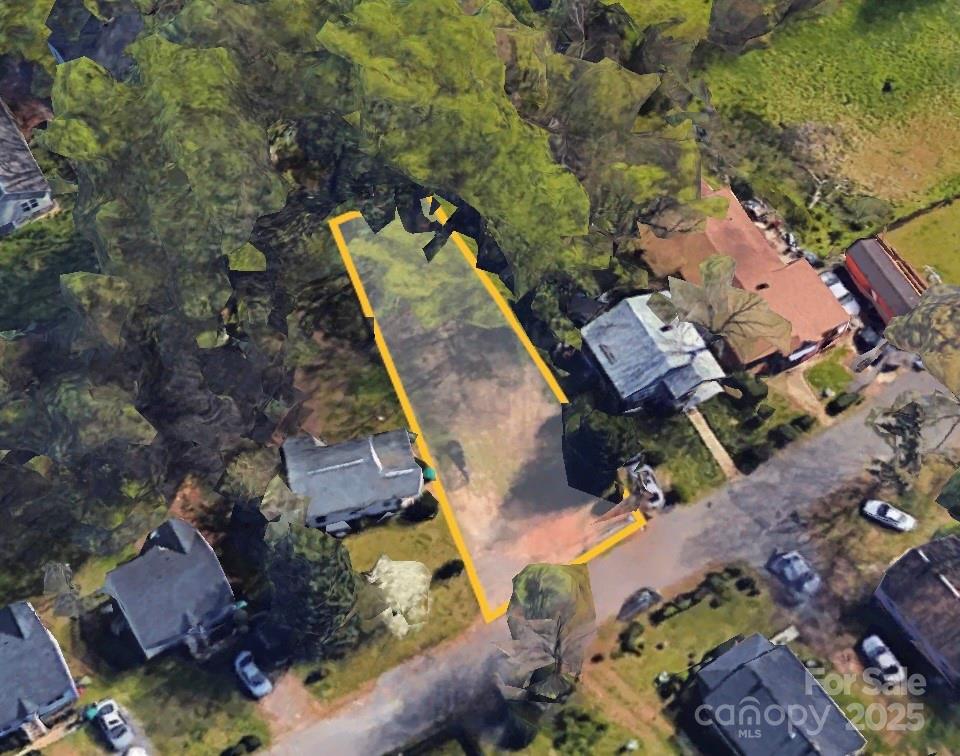 220 Avery Street Fort Mill, SC 29715 - Photo 2 of 6 an aerial view of a house with a yard