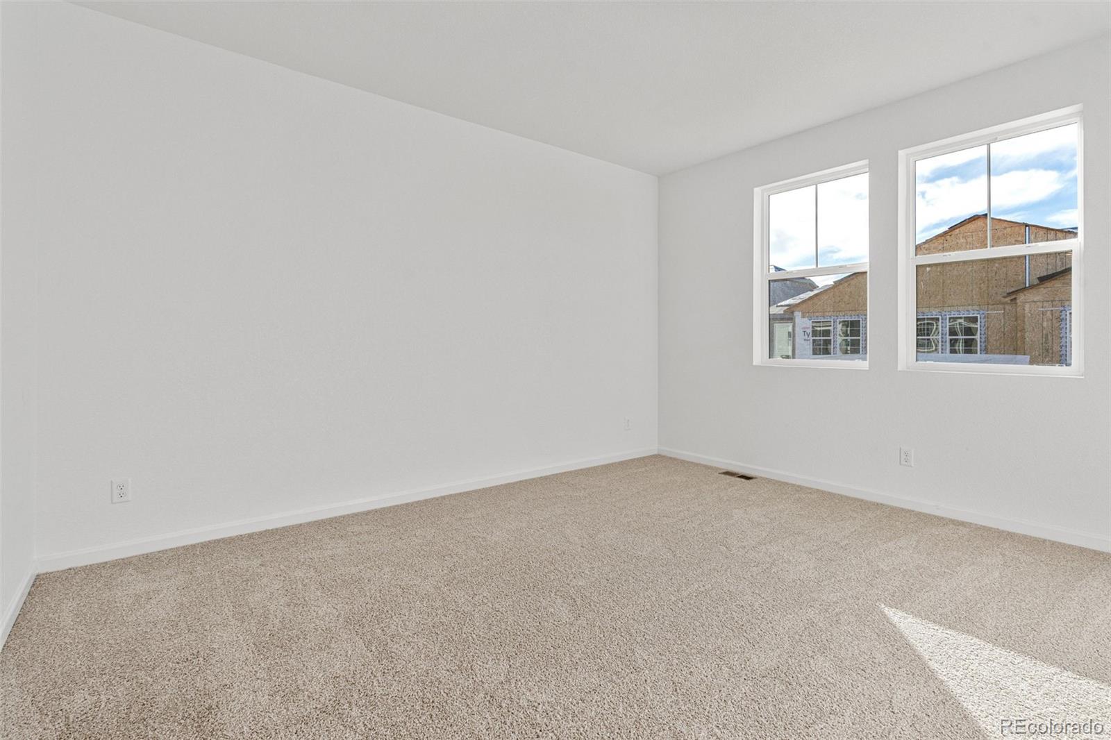 23966 E River Aurora, CO 80019 - Photo 19 of 50 an empty room with windows