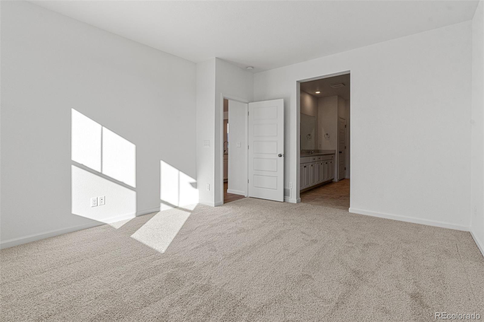 23966 E River Aurora, CO 80019 - Photo 21 of 50 a view of an empty room with window