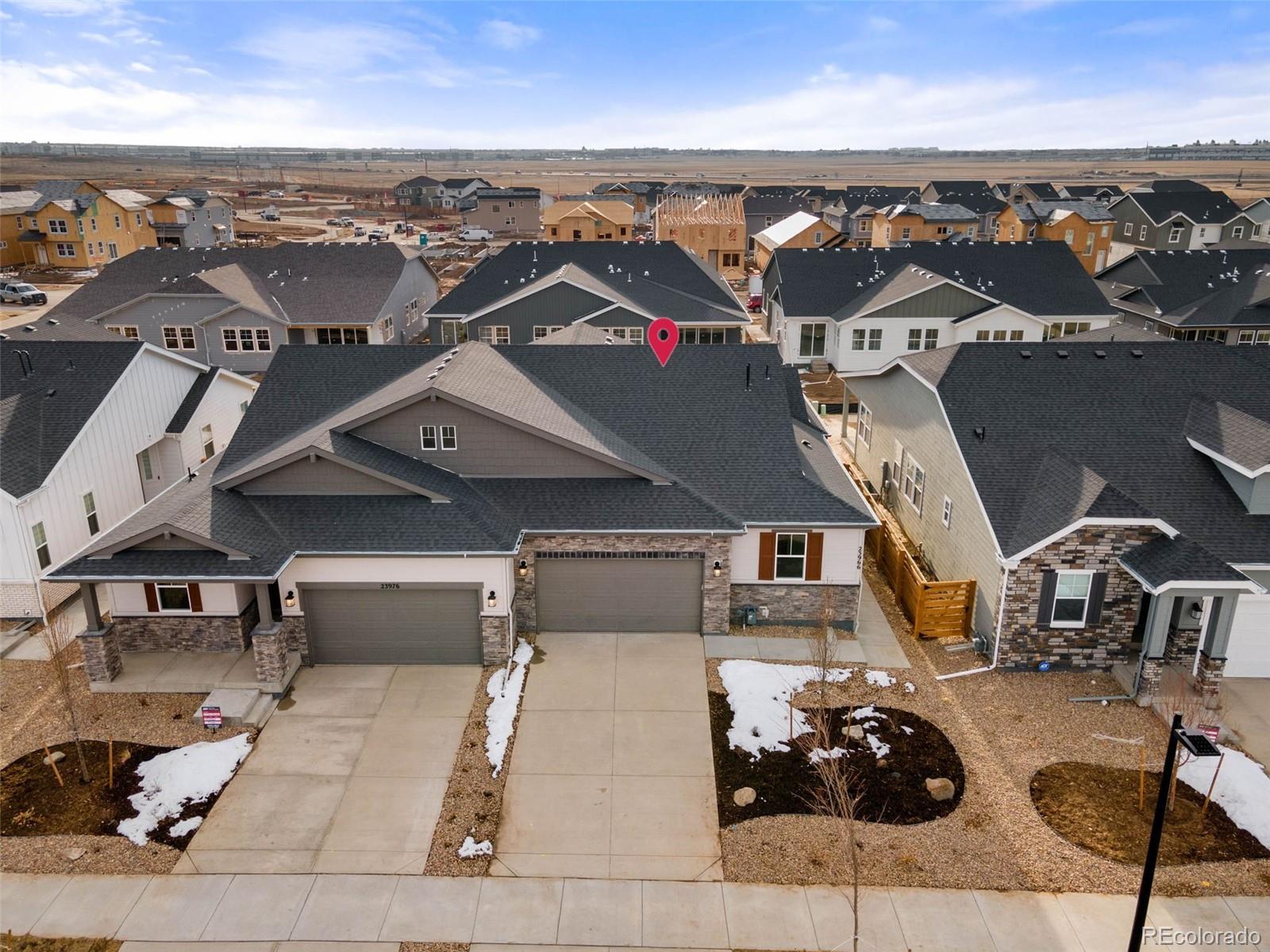 23966 E River Aurora, CO 80019 - Photo 40 of 50 an aerial view of a house with a ocean view
