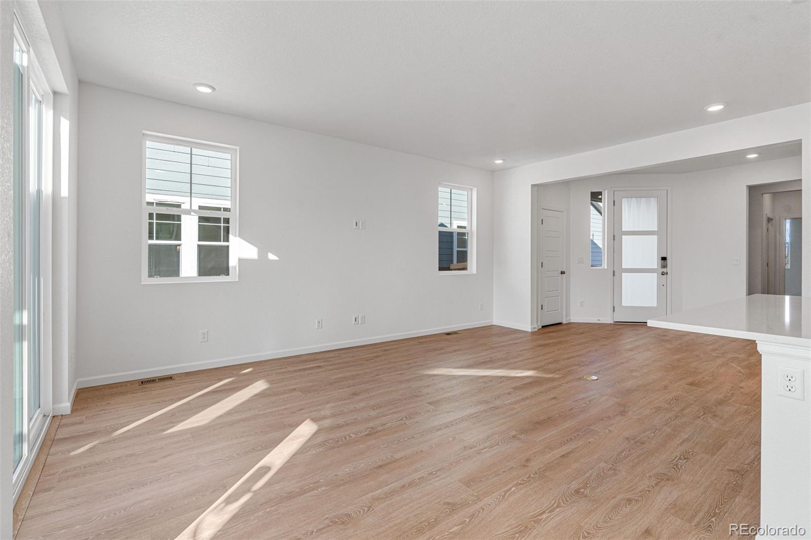 23966 E River Aurora, CO 80019 - Photo 10 of 50 a view of empty room with wooden floor and fan