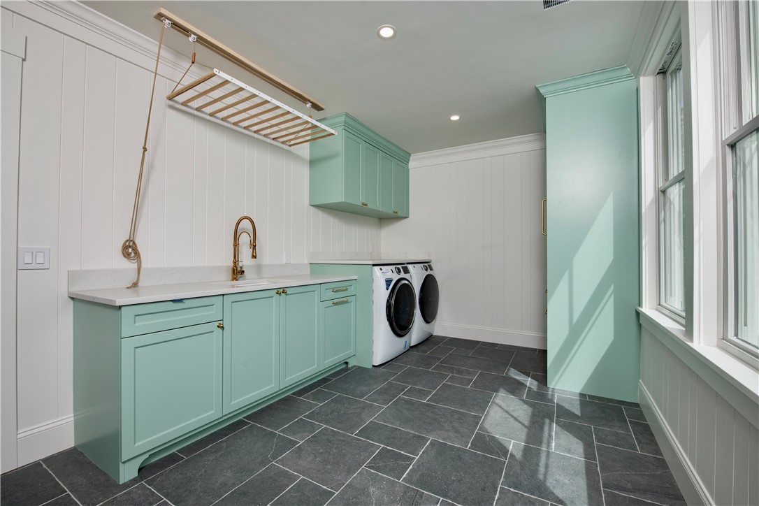 19 Sea Ridge Drive Narragansett, RI 02874 - Photo 38 of 41 Lower level laundry with full-size refrigerator and sink for outdoor use
