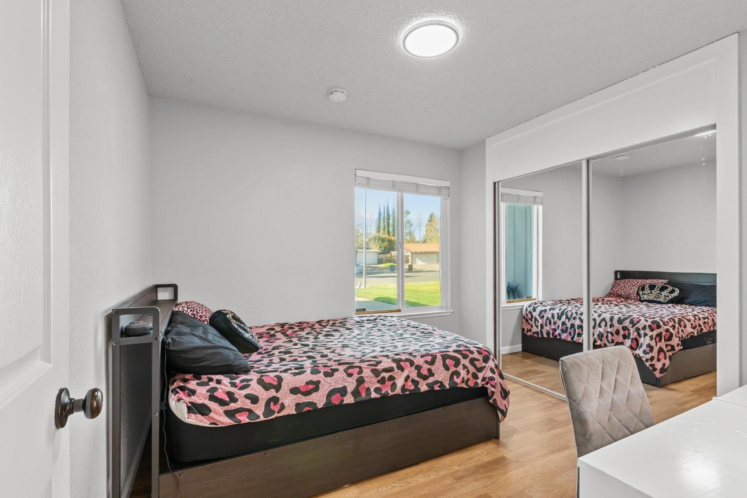 6321 Paco Court Citrus Heights, CA 95621 - Photo 16 of 36 a bedroom with furniture and windows