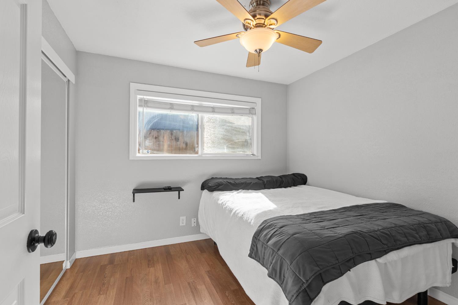 6321 Paco Court Citrus Heights, CA 95621 - Photo 17 of 36 a bedroom with a bed and a window