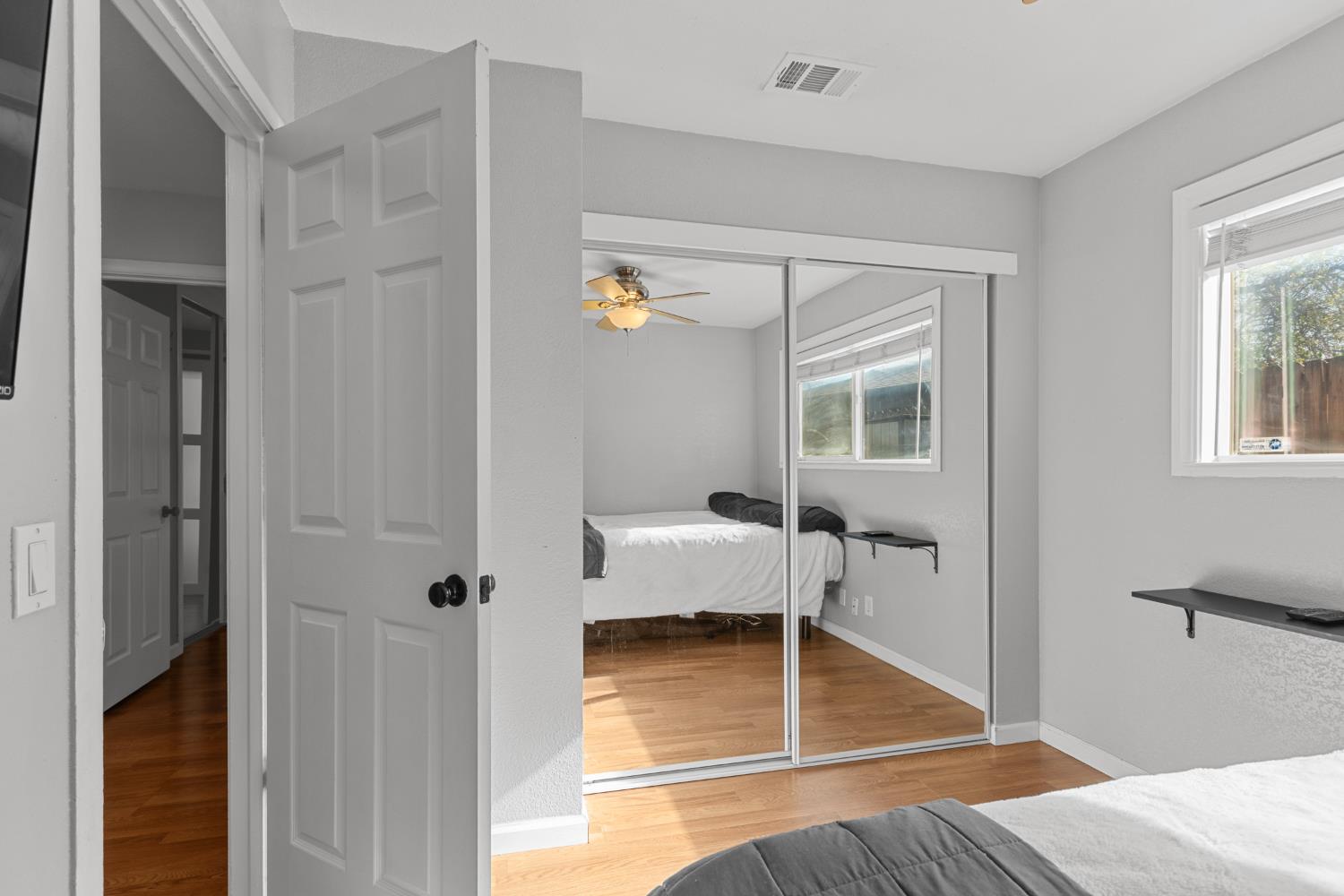 6321 Paco Court Citrus Heights, CA 95621 - Photo 18 of 36 a bedroom with a bed and a window with couch