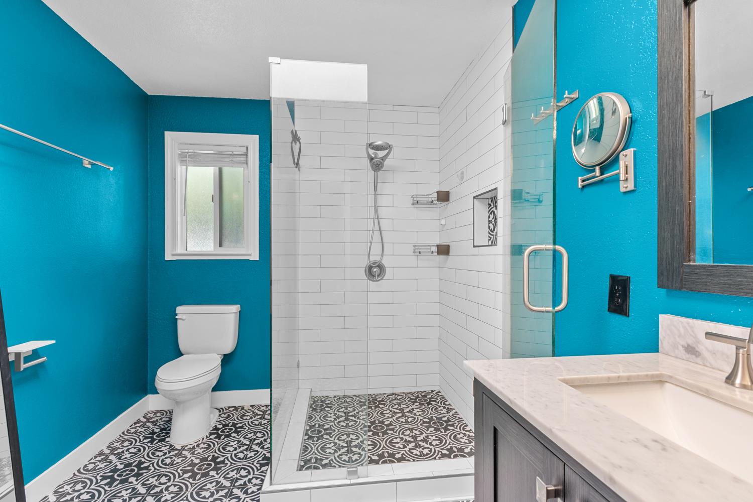 6321 Paco Court Citrus Heights, CA 95621 - Photo 22 of 36 a bathroom with a granite countertop toilet sink and mirror