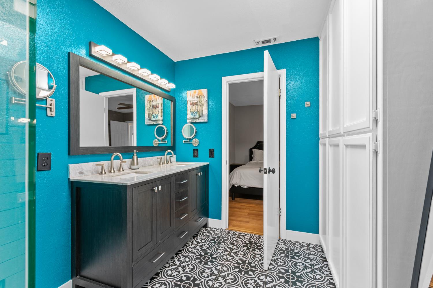 6321 Paco Court Citrus Heights, CA 95621 - Photo 23 of 36 a spacious bathroom with a double vanity sink and a mirror