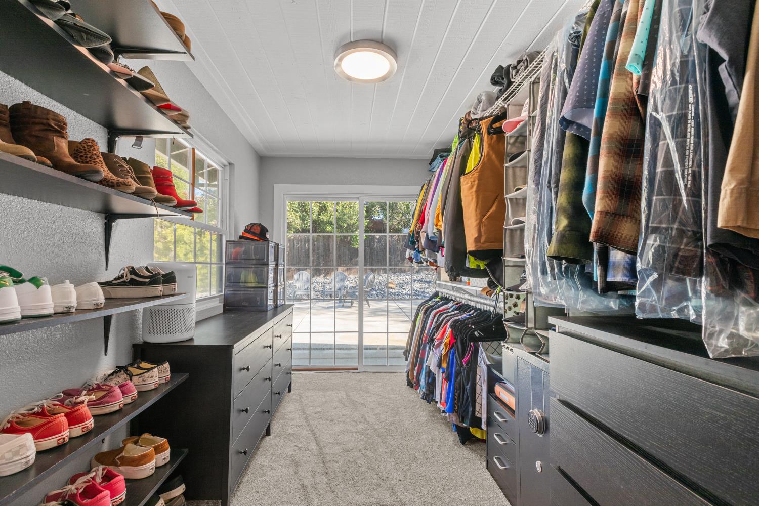 6321 Paco Court Citrus Heights, CA 95621 - Photo 25 of 36 walk in closet with clothes and shoes