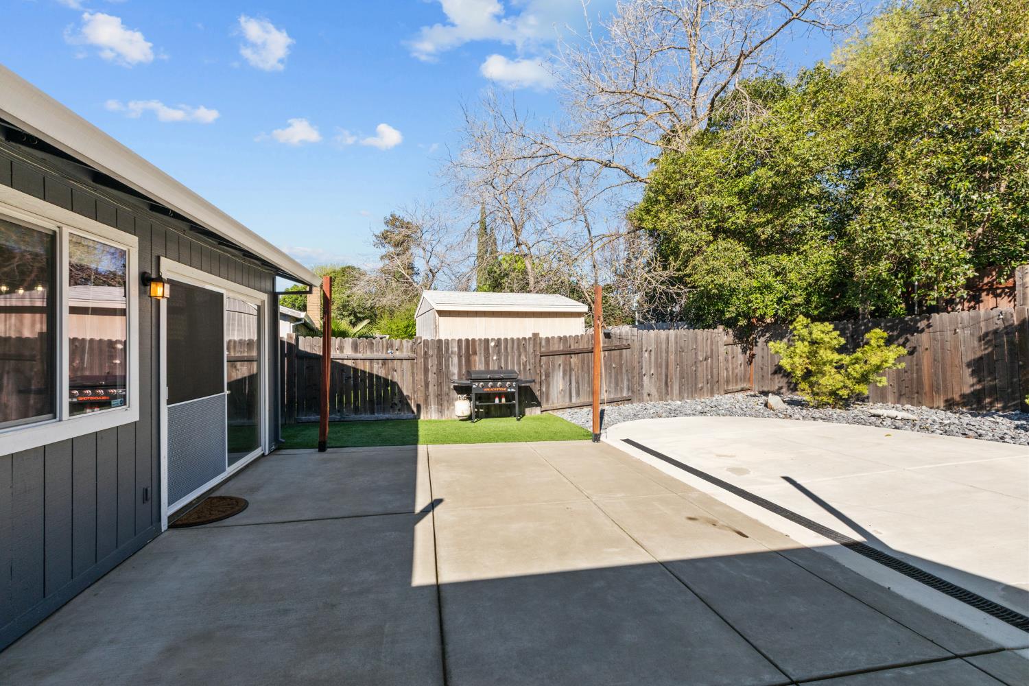 6321 Paco Court Citrus Heights, CA 95621 - Photo 28 of 36 a view of a patio with table and chairs and potted plants