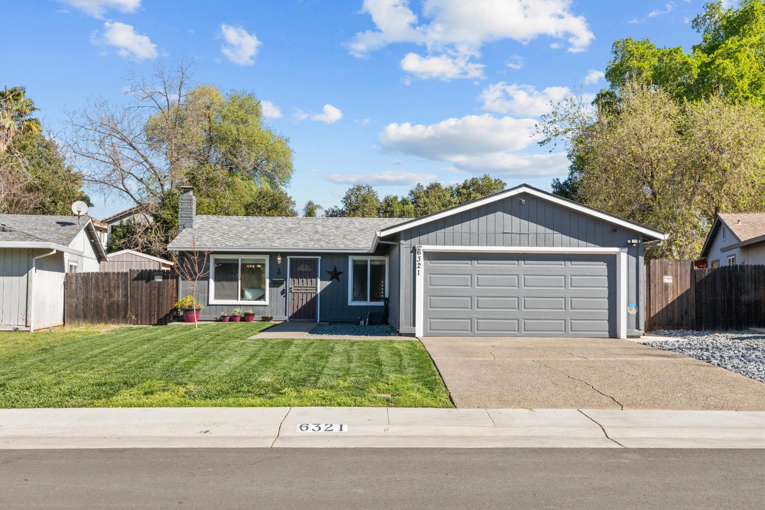 6321 Paco Court Citrus Heights, CA 95621 - Photo 3 of 36 front view of a house with a yard