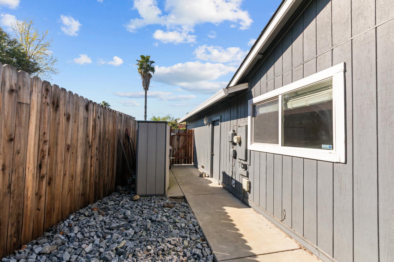 6321 Paco Court Citrus Heights, CA 95621 - Photo 32 of 36 a view of a house with wooden fence