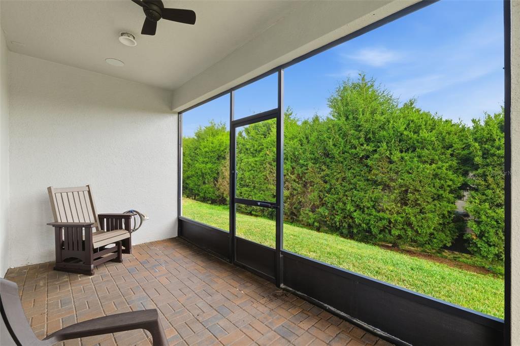 799 Asturias Road Davenport, FL 33837 - Photo 19 of 19 a view of workspace with furniture and garden view