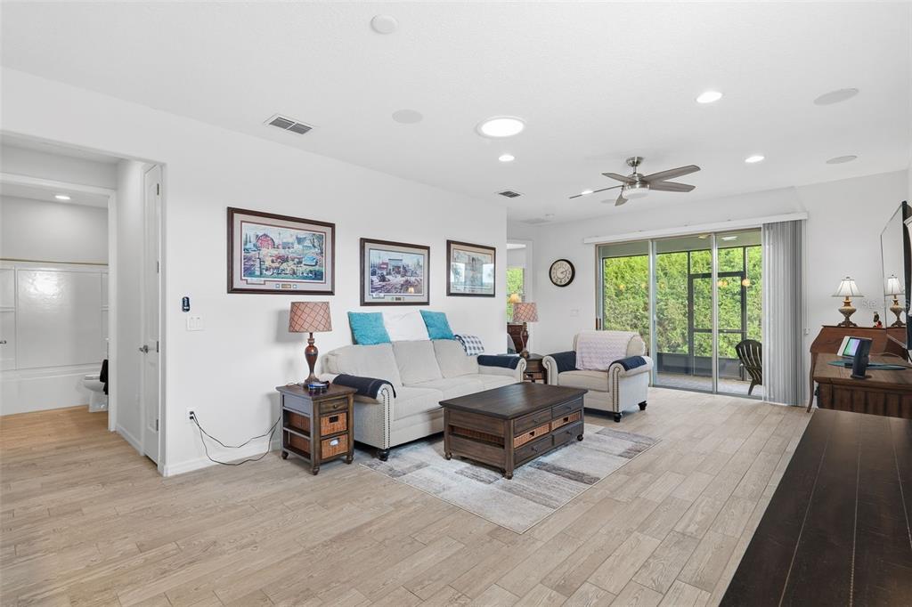 799 Asturias Road Davenport, FL 33837 - Photo 3 of 19 a living room with furniture and large windows